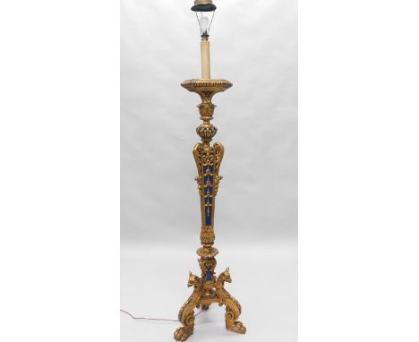 A continental giltwood standard lamp, with a tapering column and tripod base.