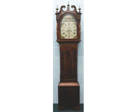 An early 19thC mahogany longcase clock, the painted arched dial not named, with an eight day striking movement, 203cm high.