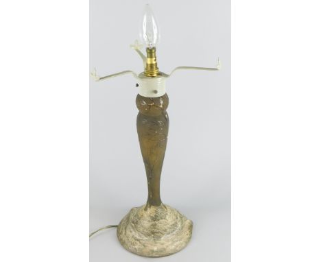 A late 19th/early 20thC Daum, Nancy lamp base, with an etched decoration of winter trees, signed to underside, lacking shade
