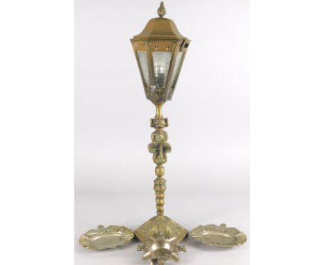 A Lincoln Imp brass oil lamp, made to simulate a street lamp, an RAF cast metal example stamped St Athan, another plain examp