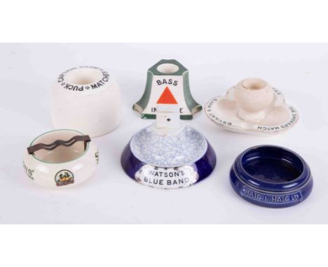 A collection of seven pub ashtrays including Watson Blue Band, Doulton Bass in a bottle, Shelly Scotch Whisky, also Captain W