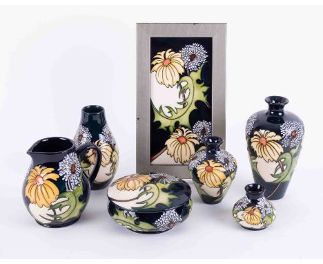 Moorcroft pottery by designer Kerry Goodwin to include rectangular plaque, trinket box, jug, vases (7).