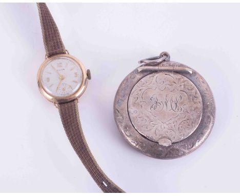 An antique silver compact with chased decoration together with Avia ladies vintage wristwatch.