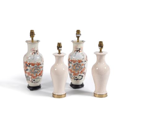 A pair of Chinese porcelain vase table lamps, modern, the white ground shouldered bodies painted with rust and grisaille flor