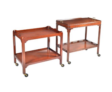 Two modern reproduction mahogany and hardwood two tier trollies, the larger with brass handles to the rectangular top, castor