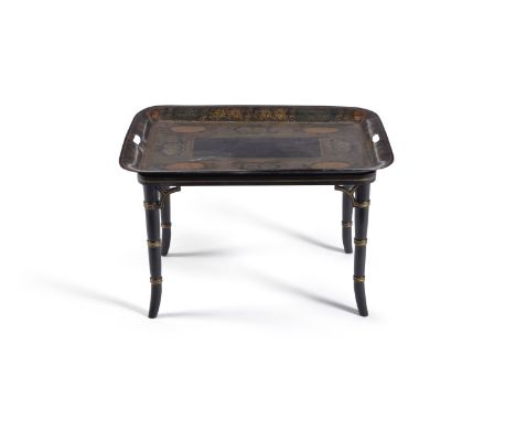 A Regency tole tray, decorated with baskets of flowers on a grey-green ground, on a on a faux bamboo table base, 50cm high ov