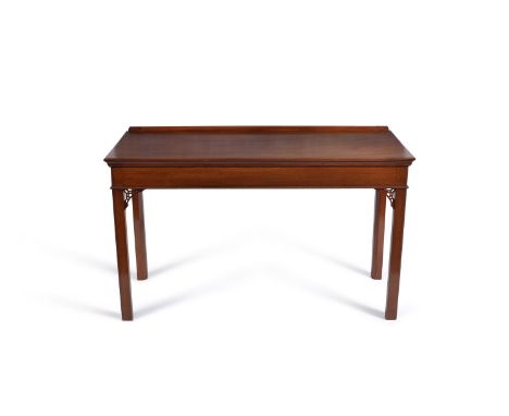 A George III and later mahogany side/serving table, the plain rectangular top with plain frieze on square section legs with p