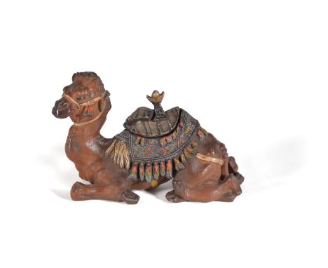 A Continental, probably Austrian, cold painted spelter Orientalist inkwell in the form of a camel, early 20th century, the an