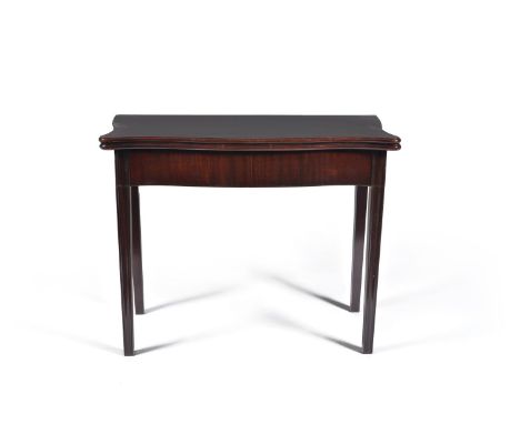 Two mid Georgian mahogany games or tea tables, each with serpentine top above plain frieze on moulded square legs, one with l