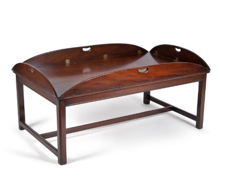 A mahogany coffee table, 20th century, in the manner of an oversized George III butler’s tray, 64cm high, the top 140cm x 87c