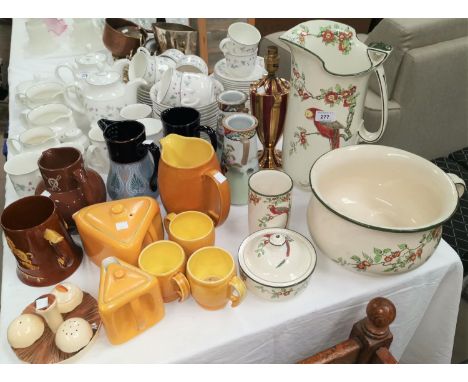 A Royal Doulton part toilet set decorated with macaws; a pair of Langley stoneware vases; a Carlton mushroom cruet; a pair of