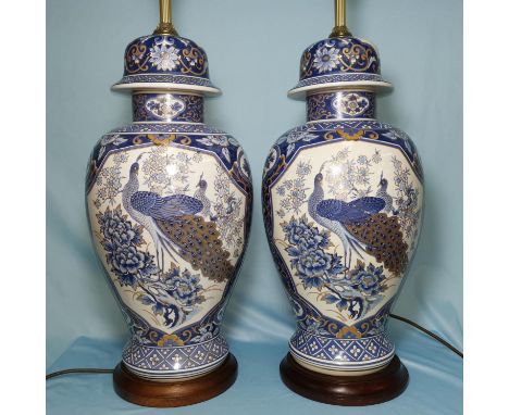 A pair of oriental blue and white lamp bases 24" 