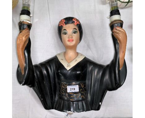 A 1950's Siamese girl 2 branch table light; a similar figure; a plaster figure 