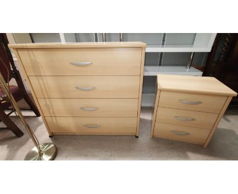 A large modern light bedroom suite comprising 4 door wardrobe (3 mirrored) a 4 height chest of drawers and a smaller chest of