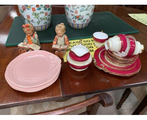 Two Goebels style figures, a part red and gilt tea service and china