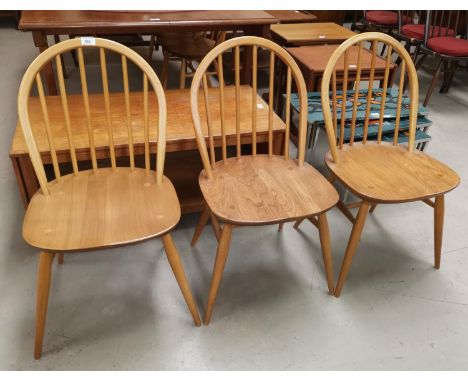 An Ercol elm and beech set of 5 dining chairs with hoop and stick backs 