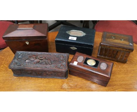 An early 19th century mahogany tea caddy and other boxes 