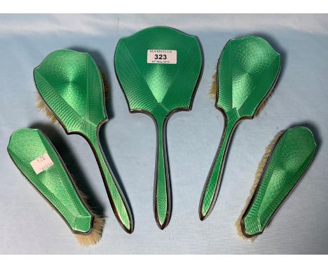 A 1930's 5 piece dressing table set with green enamel and silver backs 