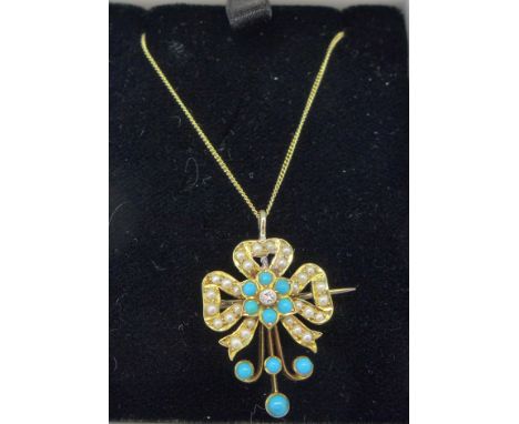 A pearl, turquoise and diamond pendant on a silver gilt chain