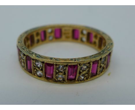 A 9ct gold, synthetic ruby and white stone full eternity ring, c.1950's, 4.8g, X