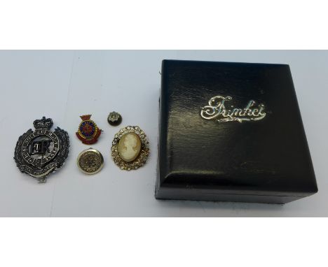 A silver mounted trinket box, cameo brooch, military badge, etc.