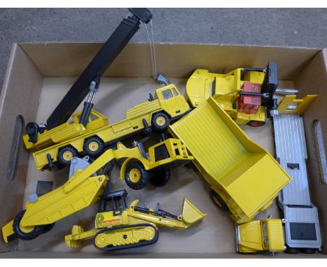 Six model construction vehicles