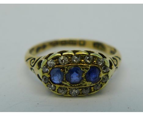 An 18ct gold, sapphire and diamond ring, 2.5g, K