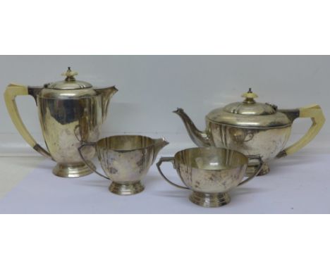 A four piece silver Art Deco tea service with ivory handles, London 1937, total weight 1726g, 55oz