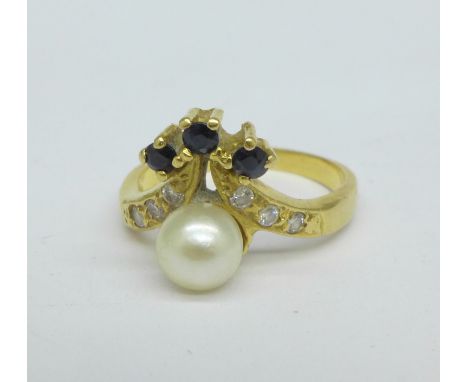 An 18ct gold, blue and white sapphire and cultured pearl ring, 4.3g, L