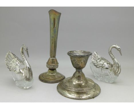 A silver vase, a silver candlestick a/f, and a pair of white metal and glass swan trinket dishes