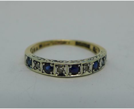 A 9ct gold ring set with five sapphires and four diamonds, 1.7g, K