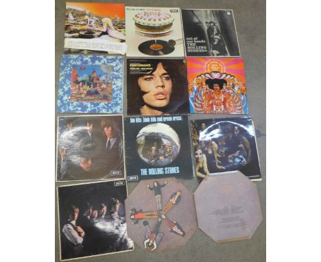 Ten LP records, Led Zeppelin (with outer sash), The Jimi Hendrix Experience, Mick Jagger and The Rolling Stones