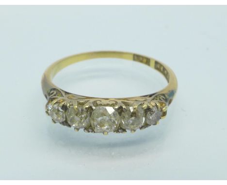 An 18ct gold, five stone diamond ring, 2.1g, K