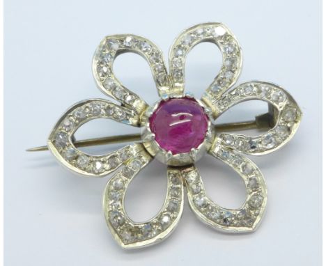 A Victorian diamond and ruby cabochon set brooch, 6g, 33mm