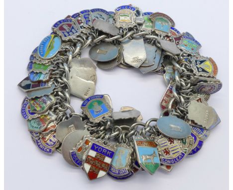 A silver and enamel charm bracelet, 154g