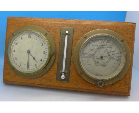 An oak mounted clock, barometer and thermometer, width 29.5cm