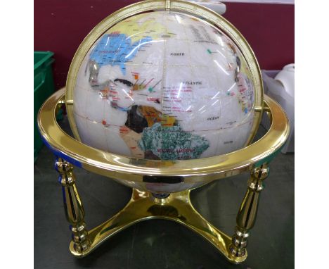A large gem set and mother of pearl globe