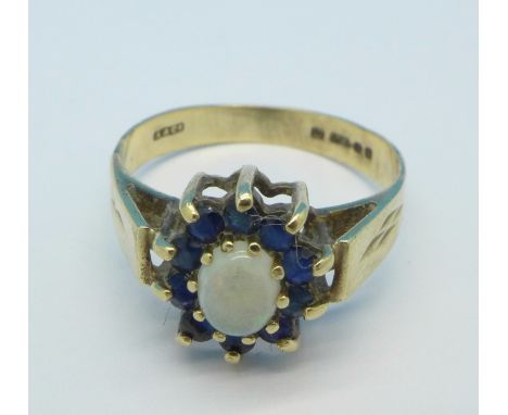 A 9ct gold, opal and sapphire ring, 2.3g, L