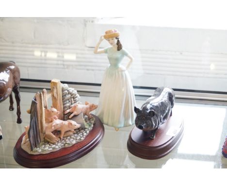 A mixed group of ceramic items to include a Royal Doulton lady figurine 'Happy Birthday', HN2001, a Border Fine Arts figure, 