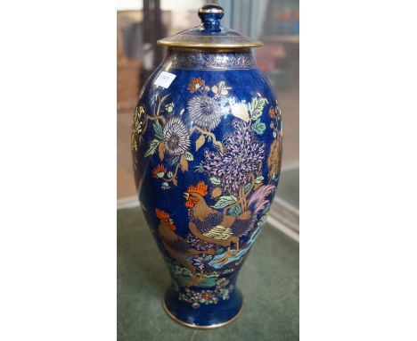 A Carltonware Kang He depicting the cock and peony upon a blue ground.