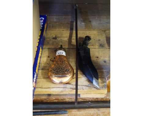 A mixed lot of military items to include a swagger stick from the Norfolk regiment, a kukri knife and a copper powder flask.