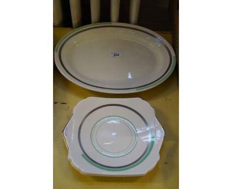 Three Shelley Regent shaped plates, decorated in the 'Mode' pattern to include a pair of square plates, diameter 25cm, oval m
