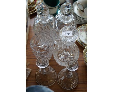 A mixed lot of assorted glassware to include cut glass decanter, candlesticks etc.