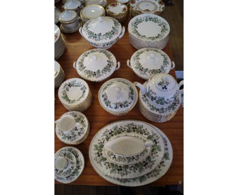 A good quality Royal Worcester Lavinia pattern dinner service to include meat plates, tureens etc.