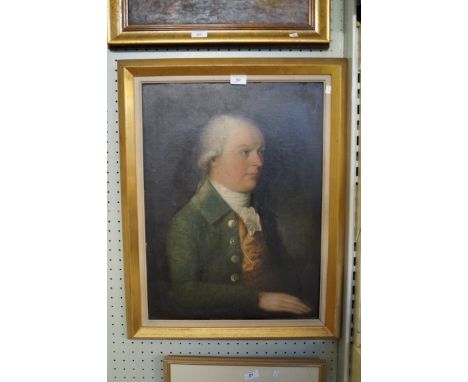 A 19th Century oil on canvas depicting a portrait of a gentleman wearing a green jacket and white neck scarf.   CONDITION REP