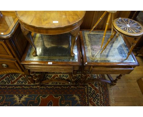 A pair of highly decorative lamp tables with gilt geometric designs and single frieze drawers.