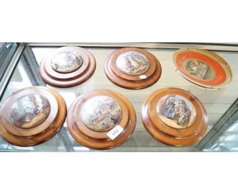 A mixed group of ceramic items to include five wooden framed Prattware pot lids to include 'Uncle Toby' and 'The Enthusiast' 