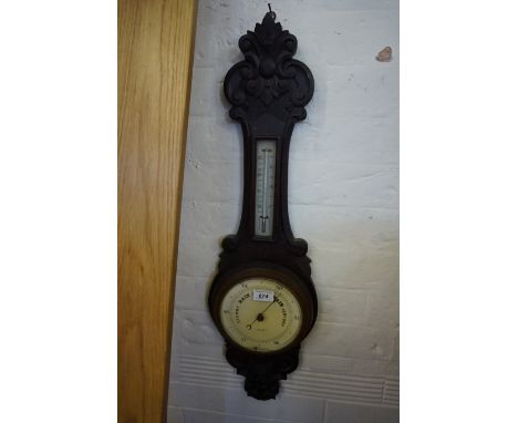 An oak framed banjo barometer.