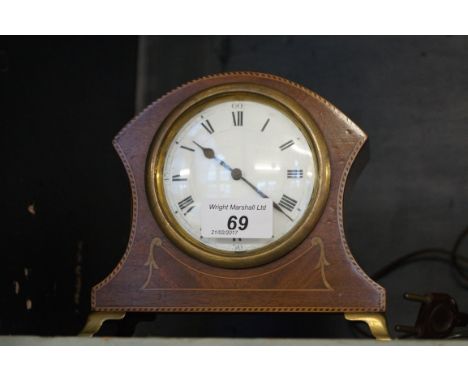 An Edwardian inlaid mahogany mantel clock.