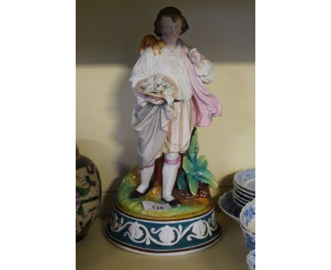A 19th Century Parian ware figural lamp base modelled in the form of a gentleman in landscape scene, together with a Willow p